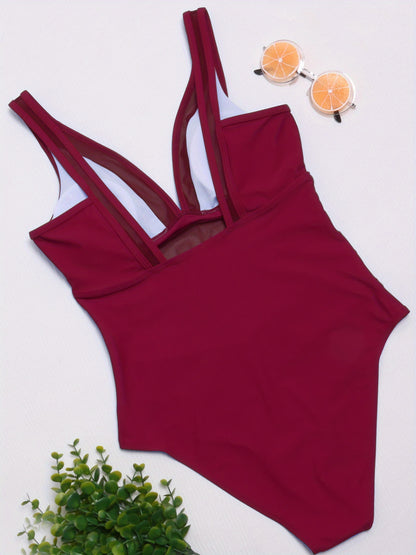 Elegant V-Neck One-Piece Swimsuit with Mesh Details